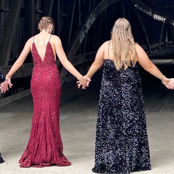 DRESS ON RIGHT - Picture 2 of 3